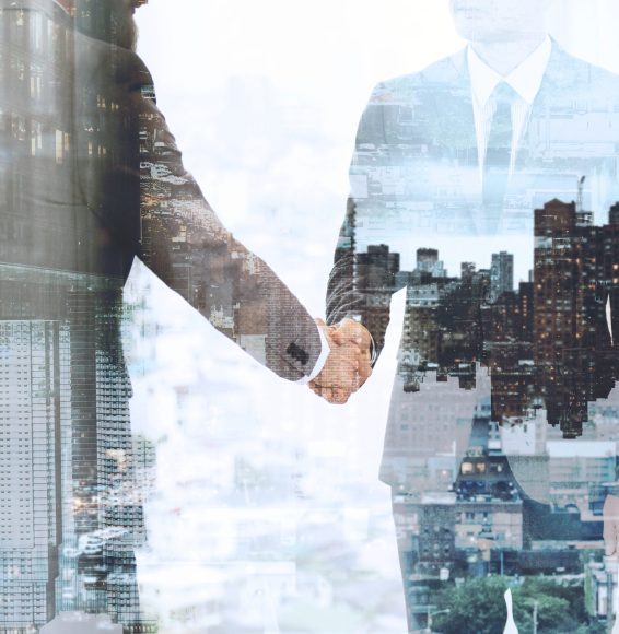Corporate business handshake between business partners